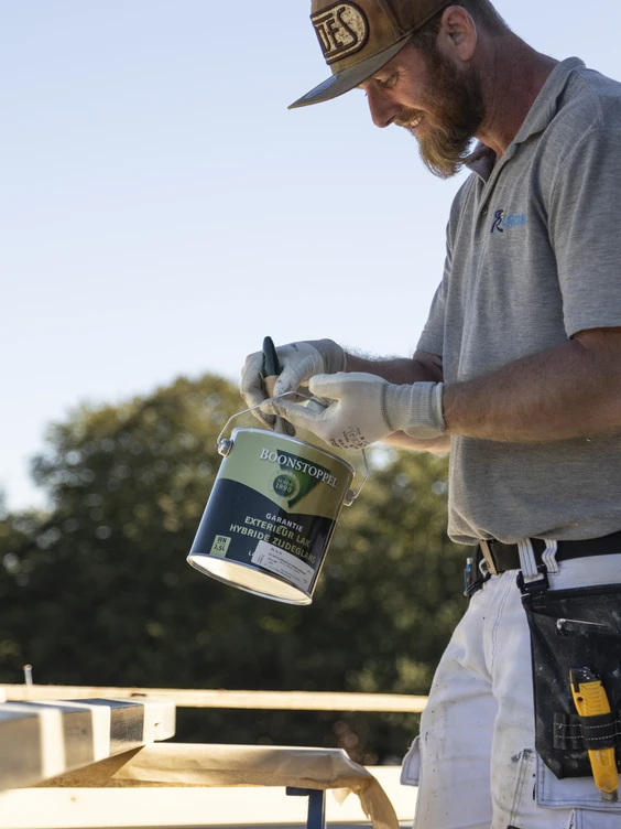 Man with a paint bucket