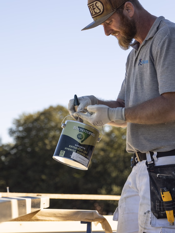 Man with a paint bucket
